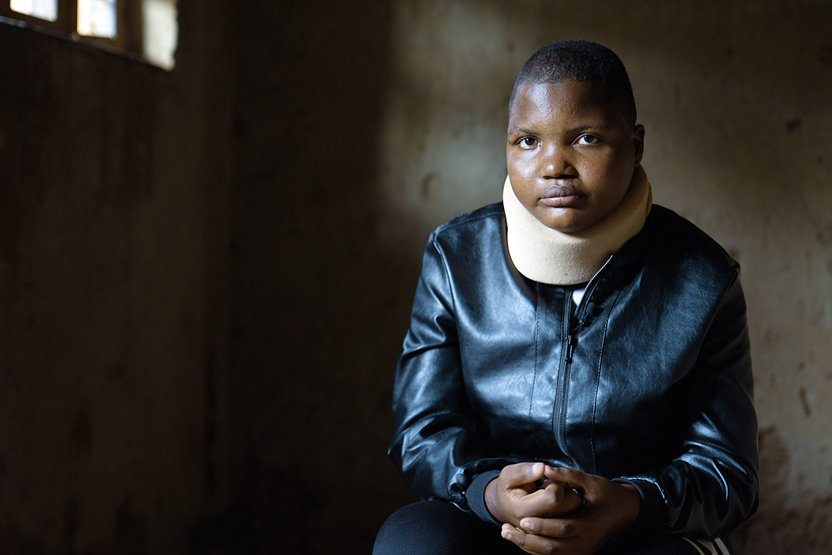 Aline Niyizurugero, a patient who received surgical care through Inshuti Mu Buzima's (as PIH is known in Rwanda) Right to Health Care program following a motorcycle accident that left her unable to walk or speak, at 16 years old.