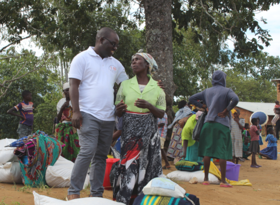 Dr. Luckson Dullie and Roda Biziwelo at a flood relief event in Neno District