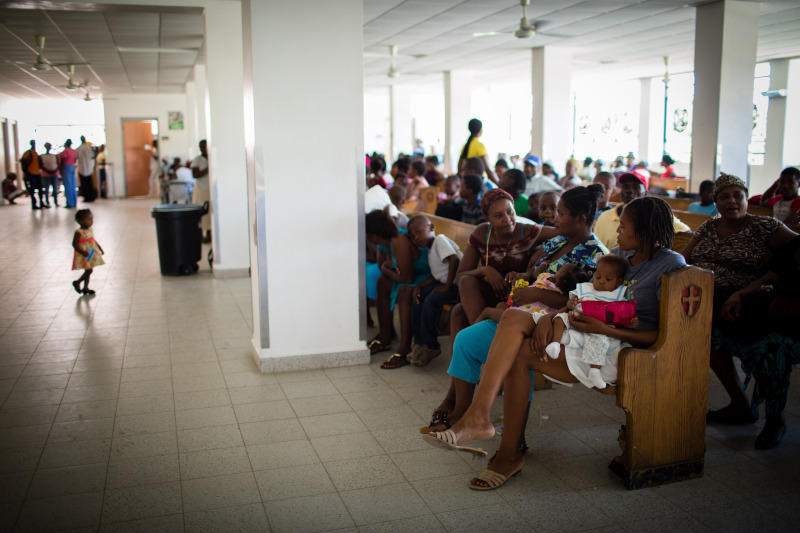 Patients wait to receive care at PIH-supported University Hospital at Mirebalais
