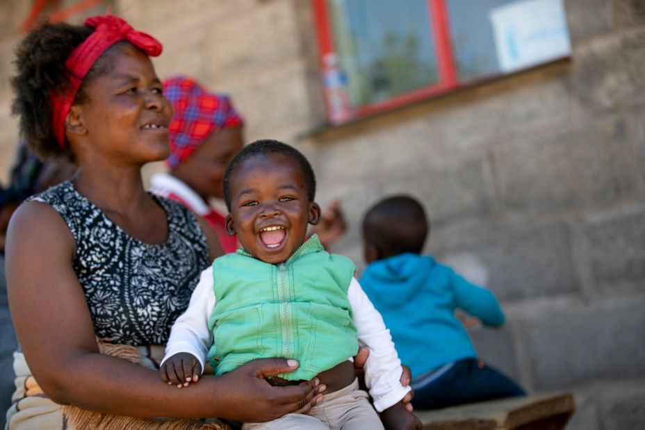 Makatiso Seeiso holds the youngest of her six children, 2-year-old Banele, at PIH-supported Nkau Health Center in Mohale’s Hoek District, Lesotho.