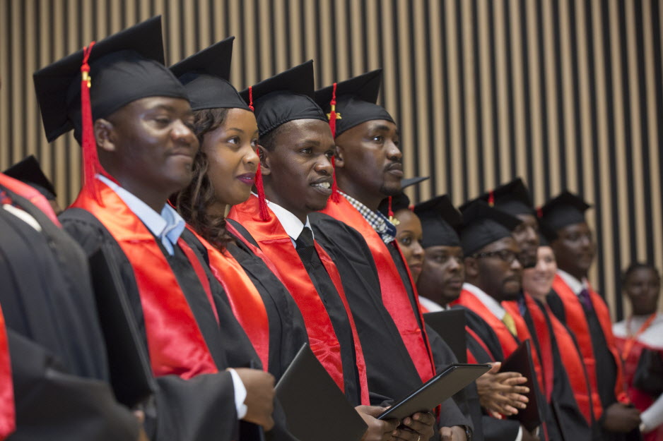 The University of Global Health Equity's first class, of 24 students, graduates in May 2017 at a ceremony in Kigali. (Photo by Zacharias Abubeker for UGHE)