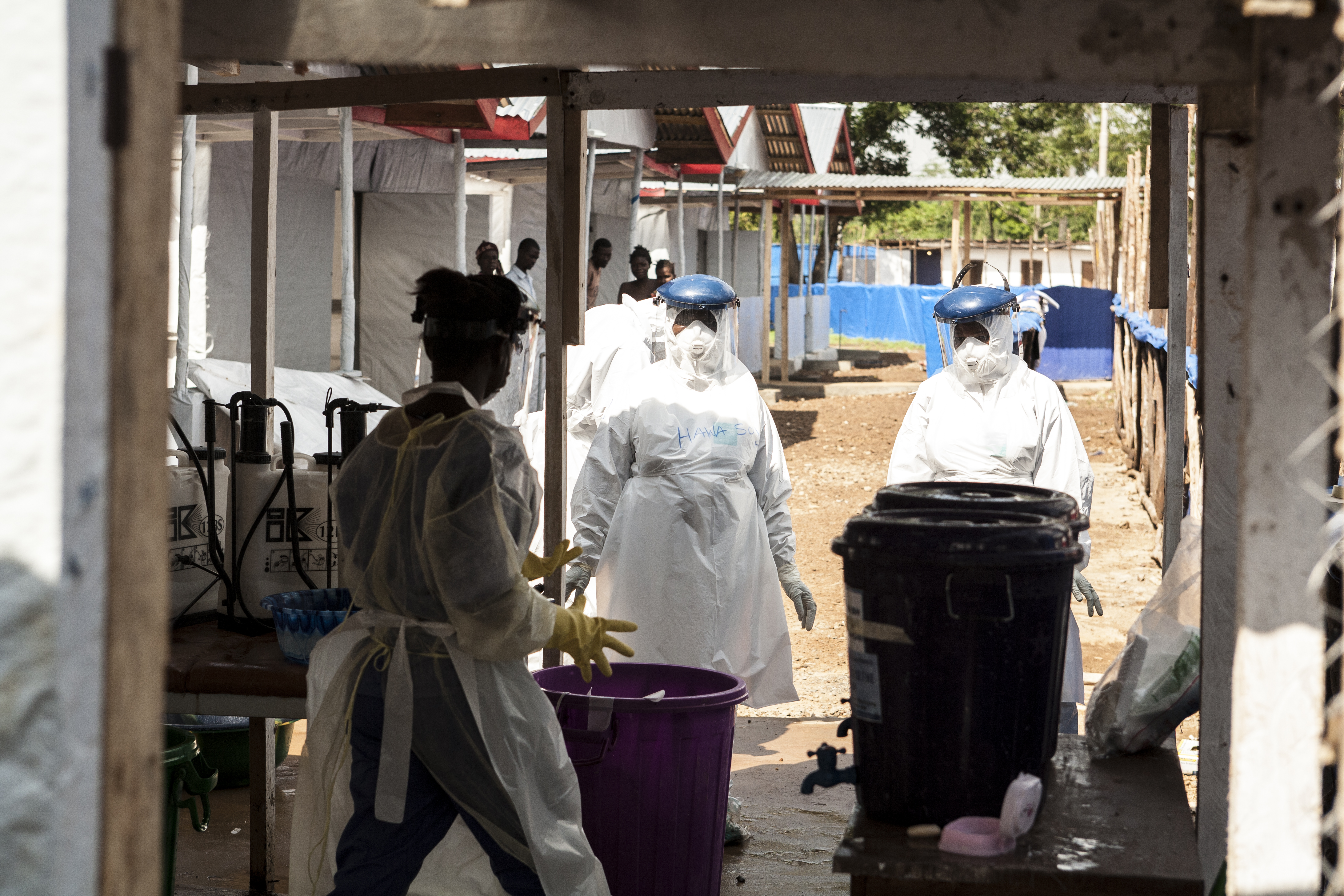 Health workers in protective garments at work in an Ebola Treatment Unit (ETU) during the 2014 crisis.