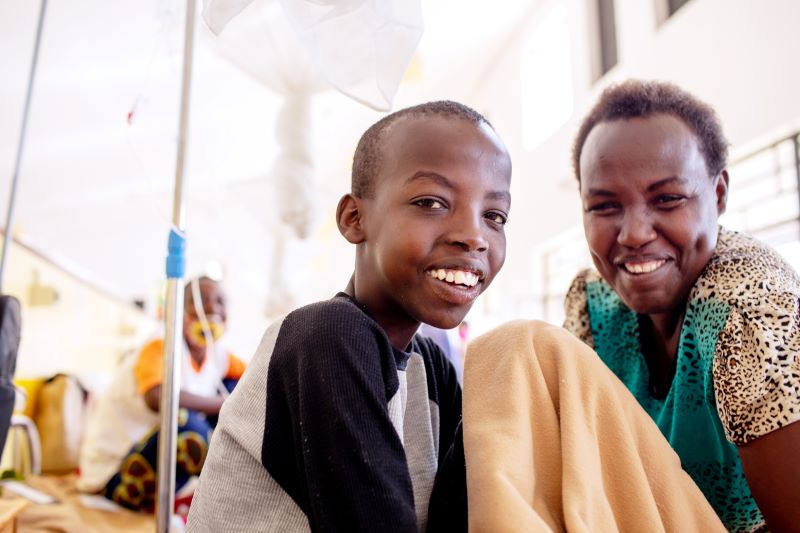 mother and son in oncology ward in Rwanda
