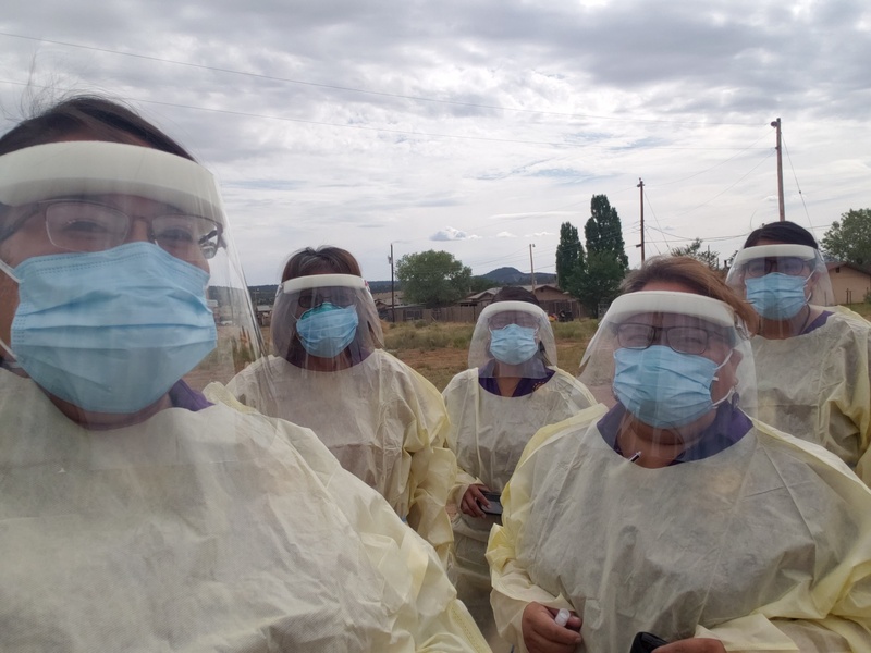 community health representatives with masks