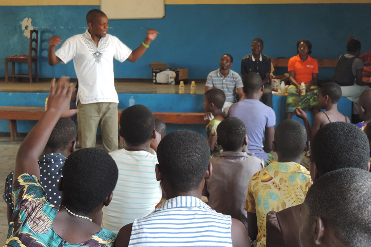 PIH nutrition officer Charles Marshal teaches at Teen HIV Club