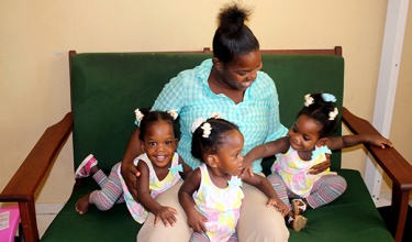One Year After Surgery, Haiti Triplets on the Move