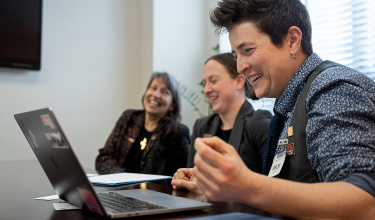 Joia Mukherjee (left), PIH senior clinical and academic advisor, Chloe Dahleen (middle), PIH economic justice specialist, and Fynn Crooks (right), PIH advocacy senior community organizer, meet with congressional staffers.