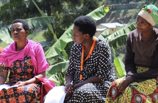 three women sitting and talking