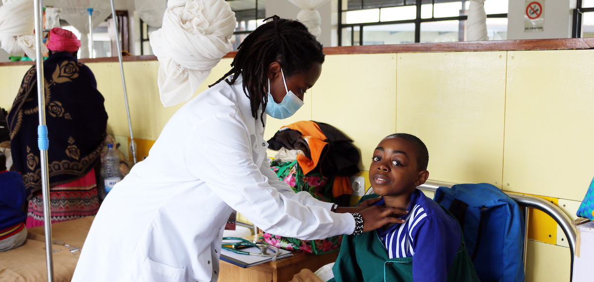 doctor checking patient