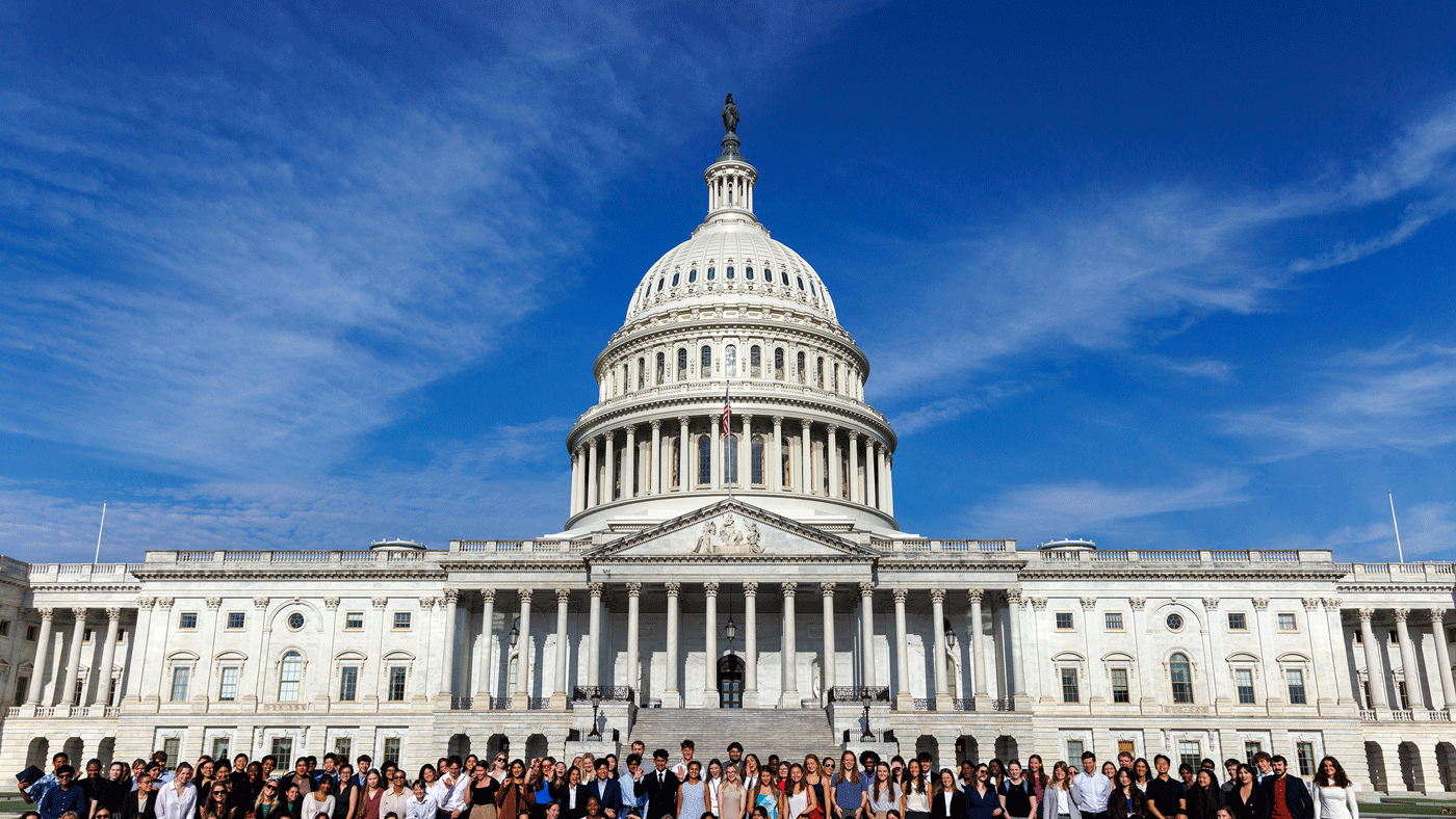 people in front of U.S. capitol building
