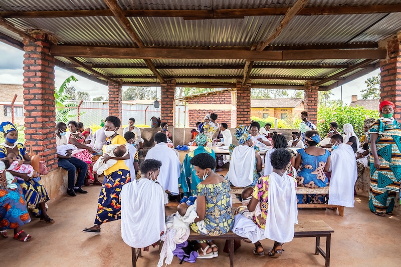 Patients sit in a waiting room in Rwanda
