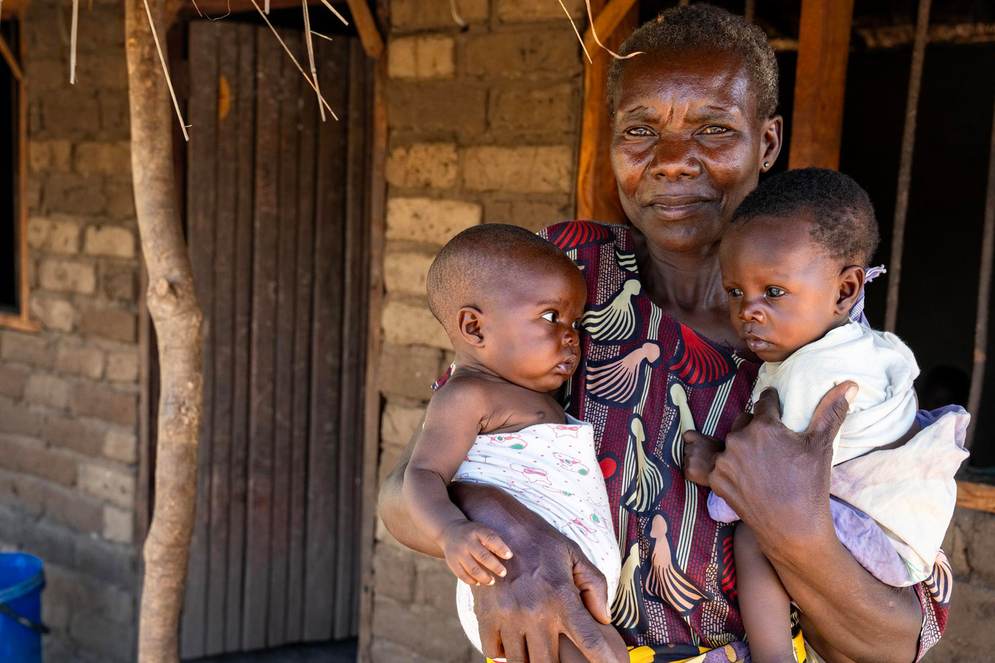 Grandmother and twins in Malawi