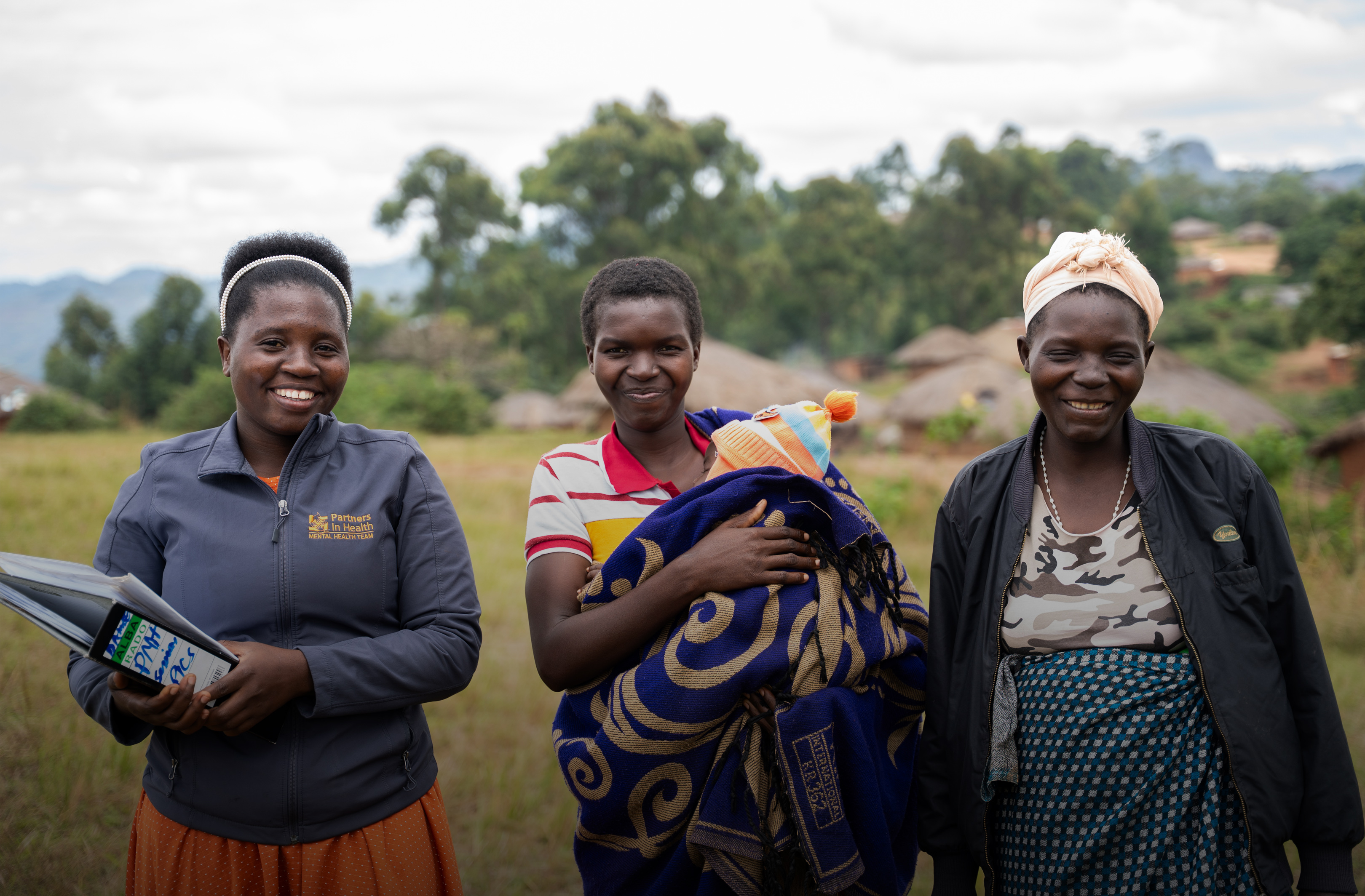 Mental Health counselor and two patients in Malawi