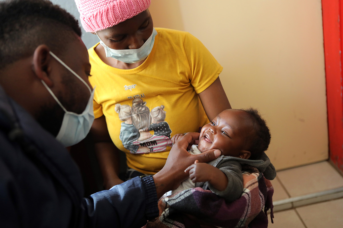 Nurse Mohlomi Maputle conducts a pediatric checkup.