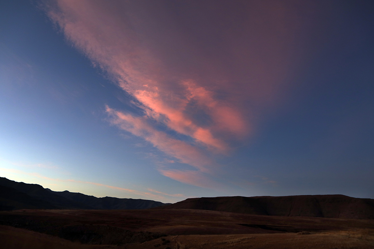 Sunset clouds over the Senqu River canyon at dusk.