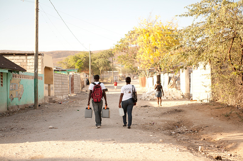 PIH conducts a door-to-door cholera vaccination campaign in the Artibonite Valley region of Haiti in 2012. 