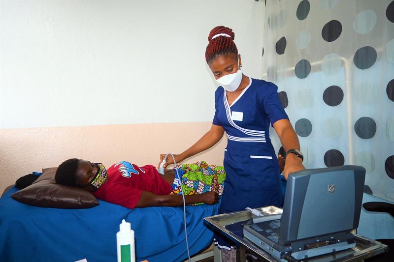 nurse performs ultrasound