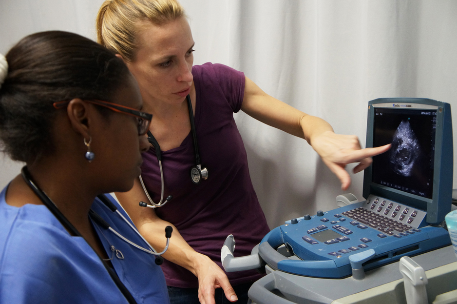 Dr. Cassandre Edmond, left, and Dr. Regan Marsh review an ultrasound in 2014 