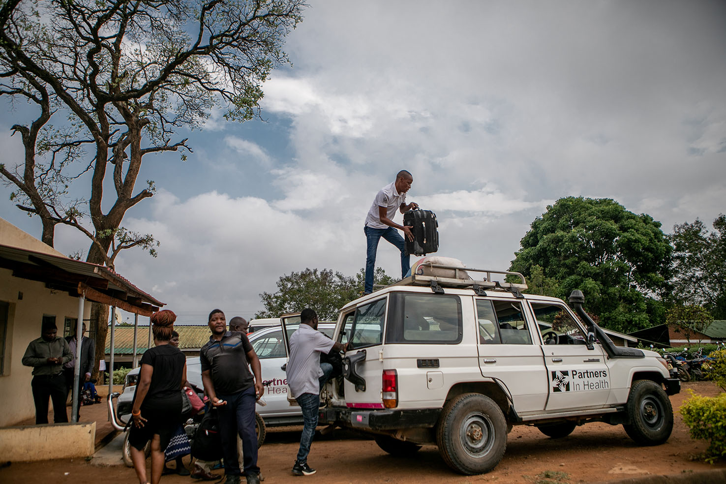 PIH staff load a truck with social support items in Neno, Malawi