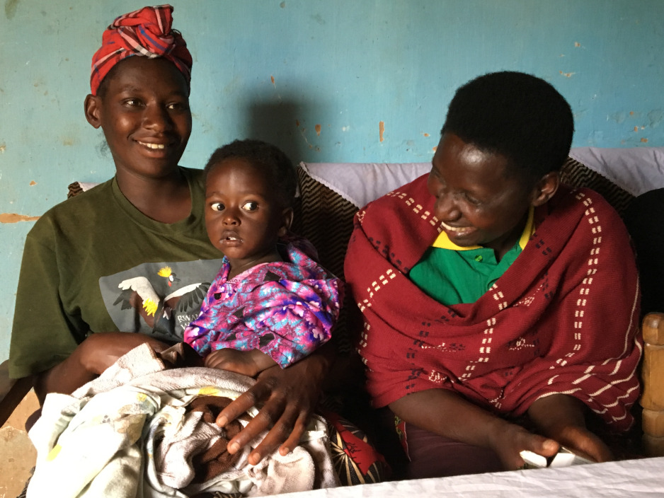 Françoise Umutesi enjoys a moment with her grandson