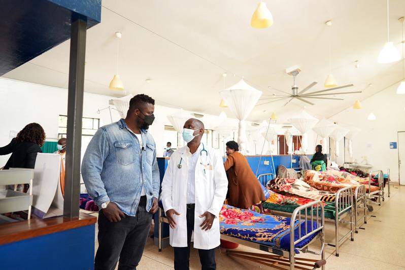 Winston Duke speaks with a physician