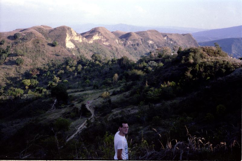 Paul Farmer with a mountain view in rural Haiti