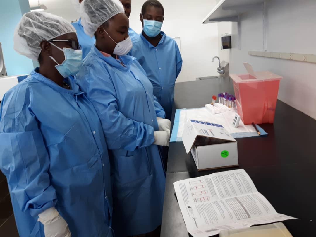 lab staff train on proper use of rapid diagnostic tests for COVID-19 in Haiti