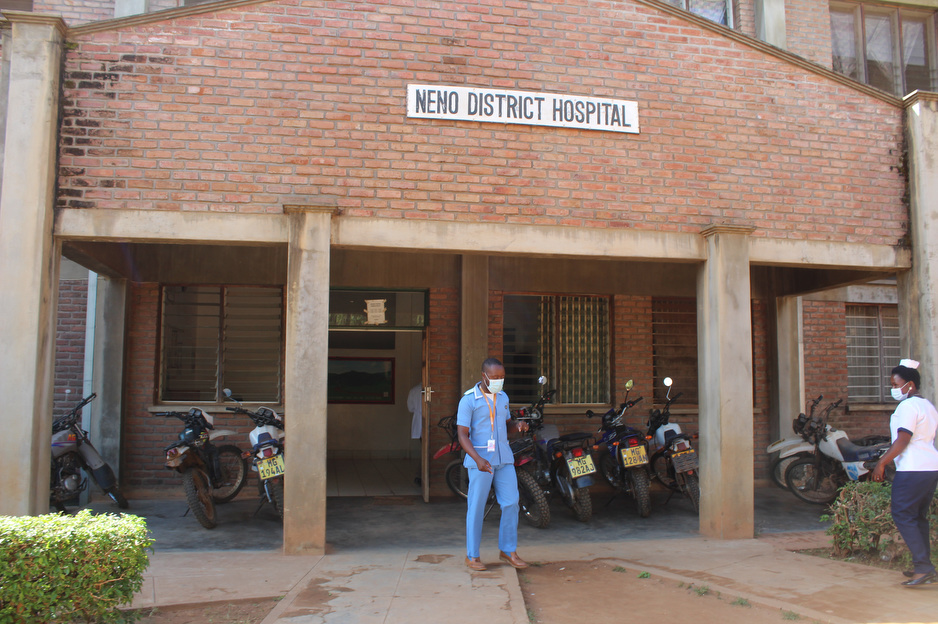 Isaac Mphande walks out of Neno District Hospital. Photo by Janet Mbwadzulu / PIH.