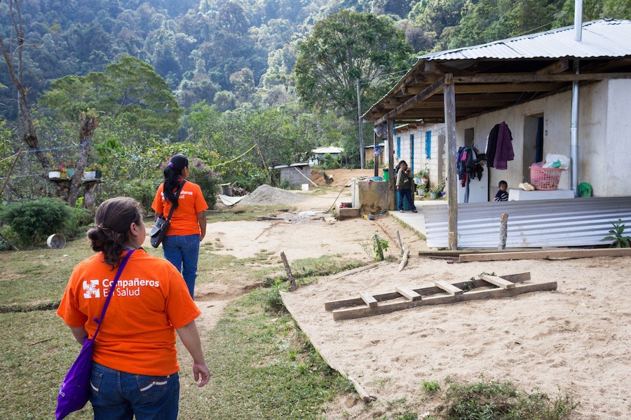 In this picture, Community Health Workers Yadira Roblero and Magdalena Gutiérrez approach a home in Laguna Del Cofre for a house call in March 2016