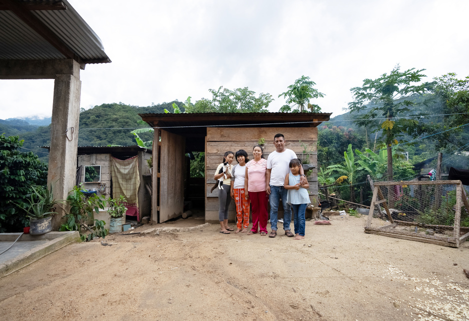 Ariadna stands with her family in their home in Plan de la Libertad in Chiapas, Mexico. Photo by Masao Yanome for PIH.