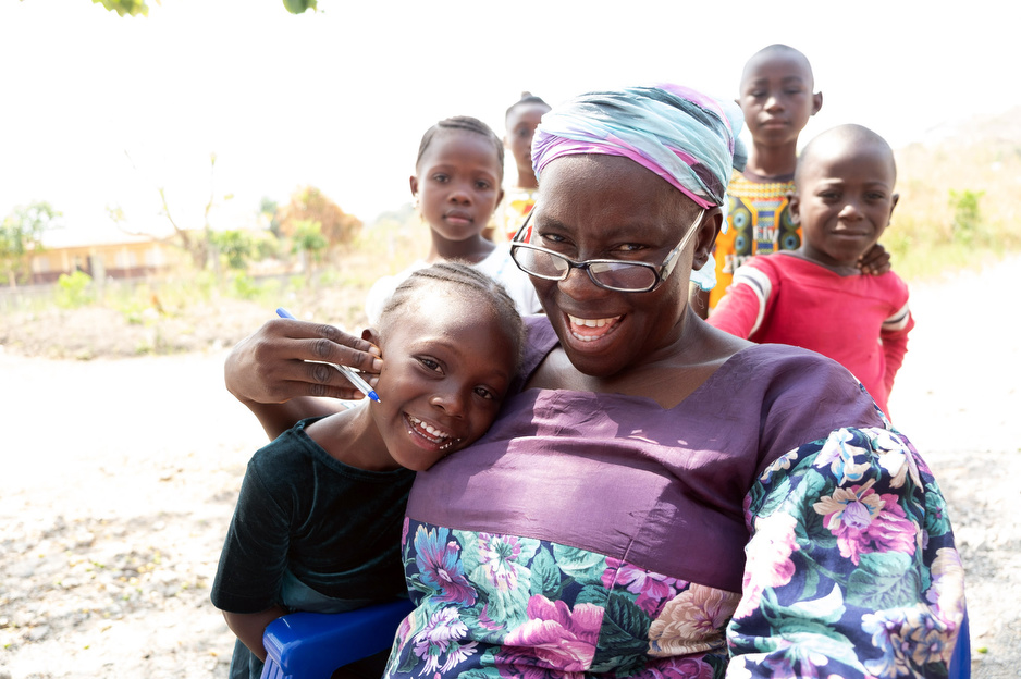 Mariama Mansaray with children in PIH Sierra Leone's malnutrition program