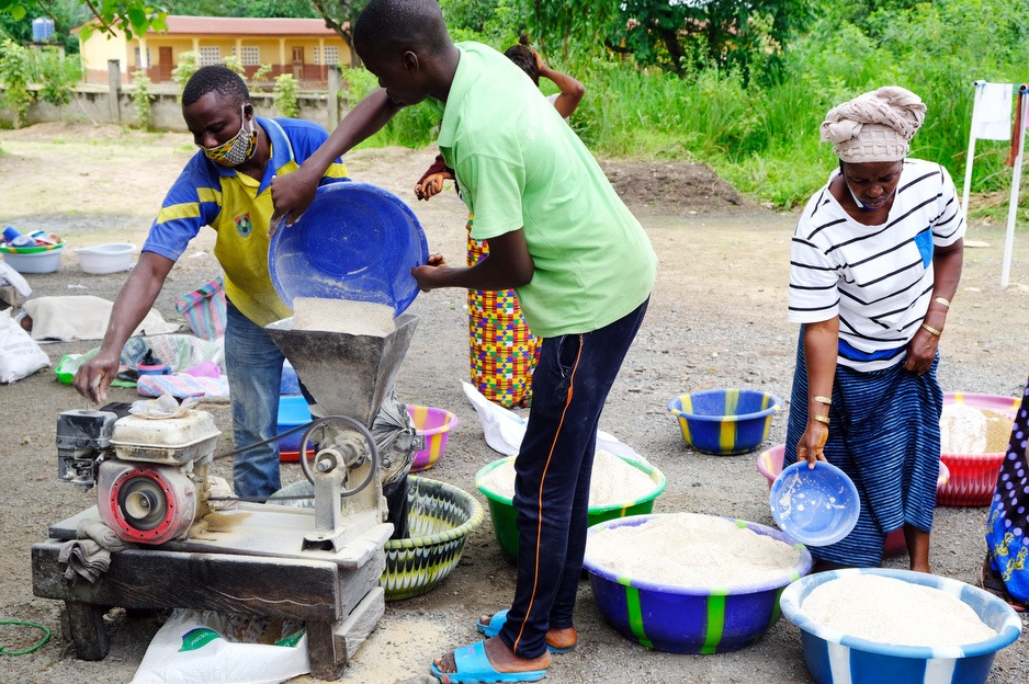 Preparing Bennimix as part of PIH Sierra Leone's malnutrition program