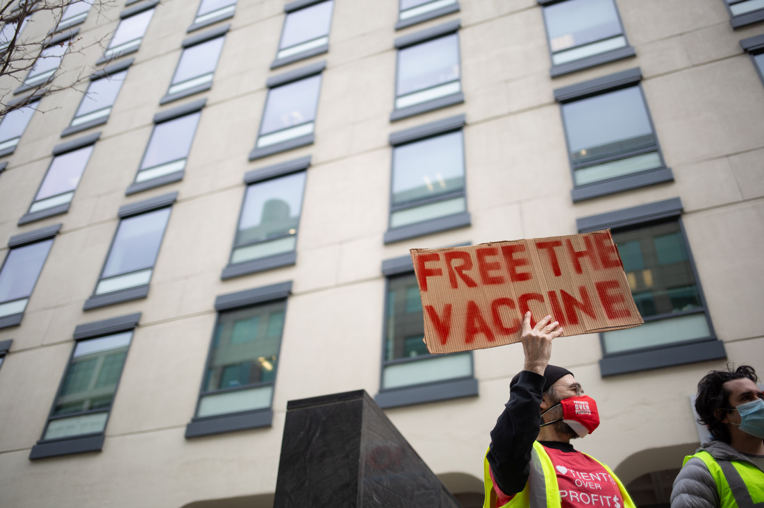 Supporters of the People's Vaccine participate in a rally for global solidarity against vaccine apartheid in Cambridge, Massachusetts, which is home to a heavy concentration of pharmaceutical and biotechnology companies.
