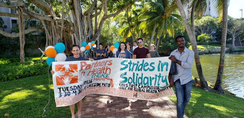 PIH Engage Miami hosts a 2019 global health equity lecture and walk event in solidarity with community health workers.