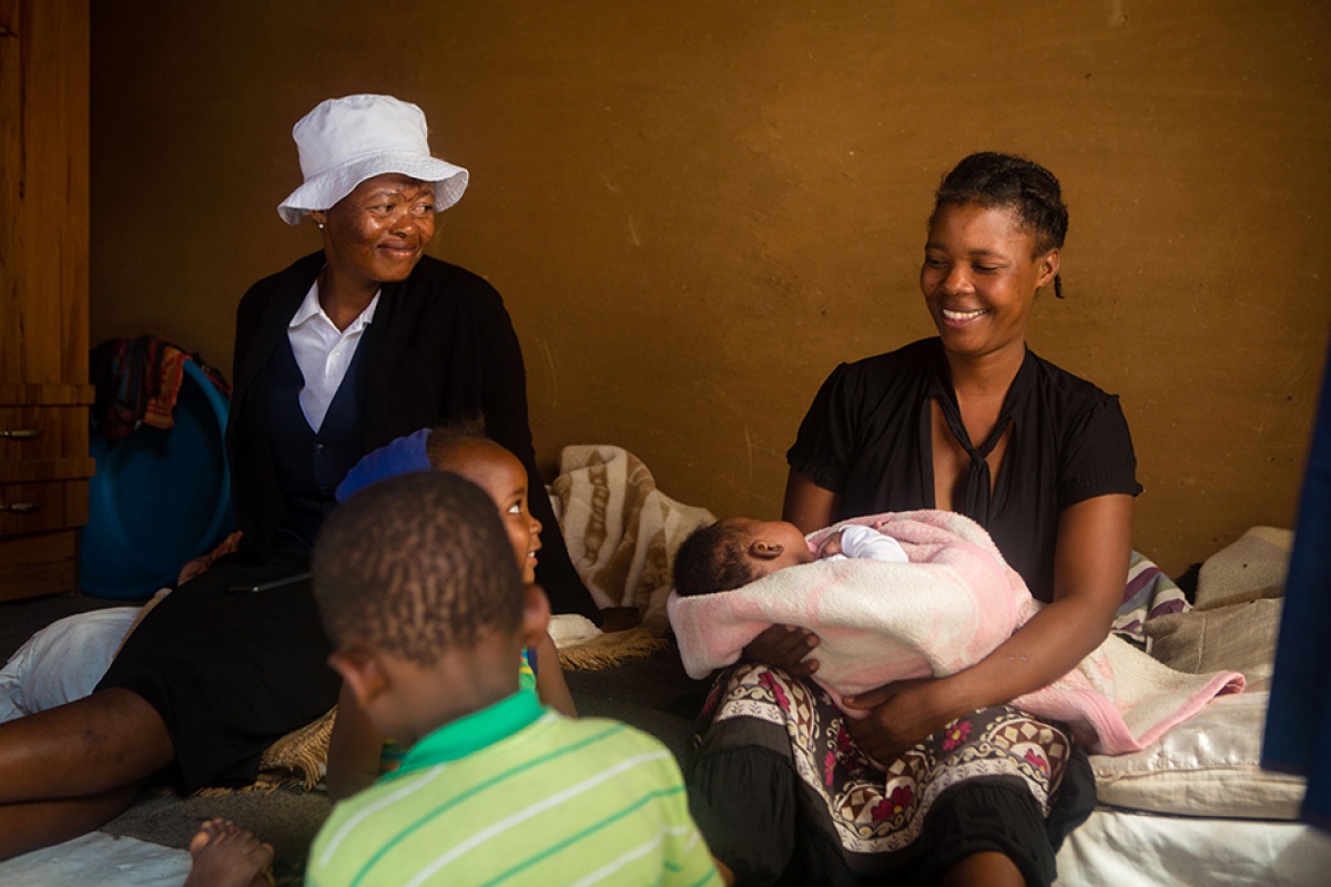 Mafelleng September and her children at their home