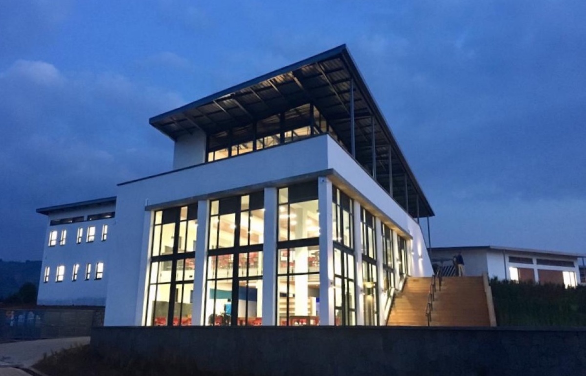UGHE's administration building lights up twilight on campus in January 2019.