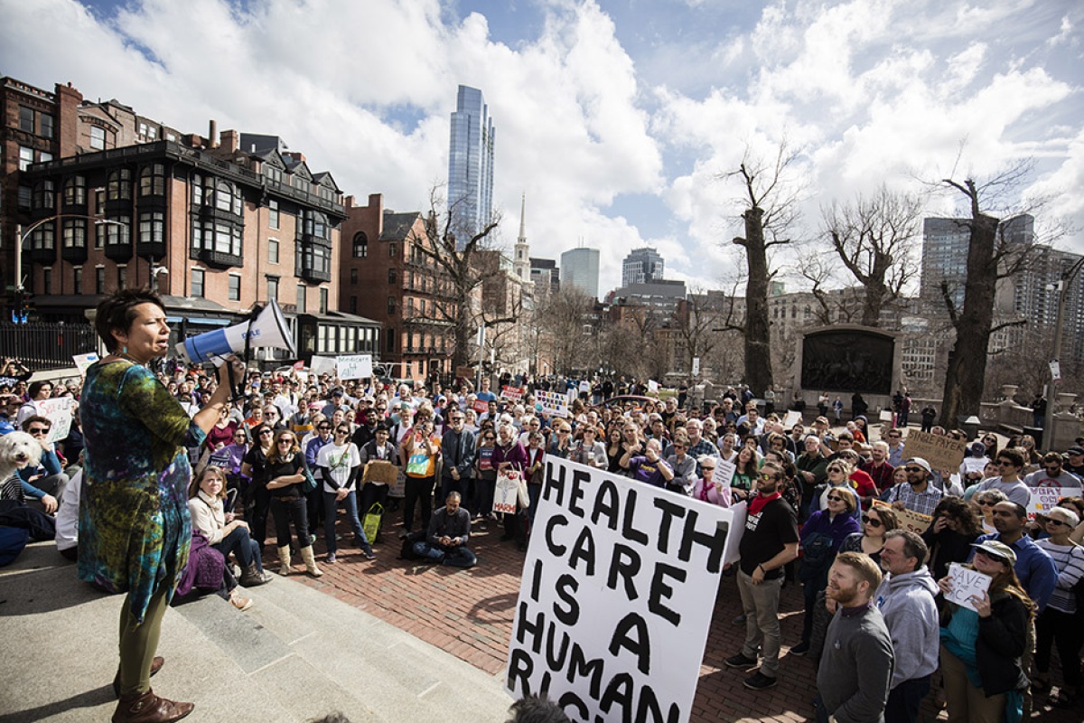 PIH Chief Medical Officer Dr. Joia Mukherjee speaks at a rally outside the Massachusetts State House.