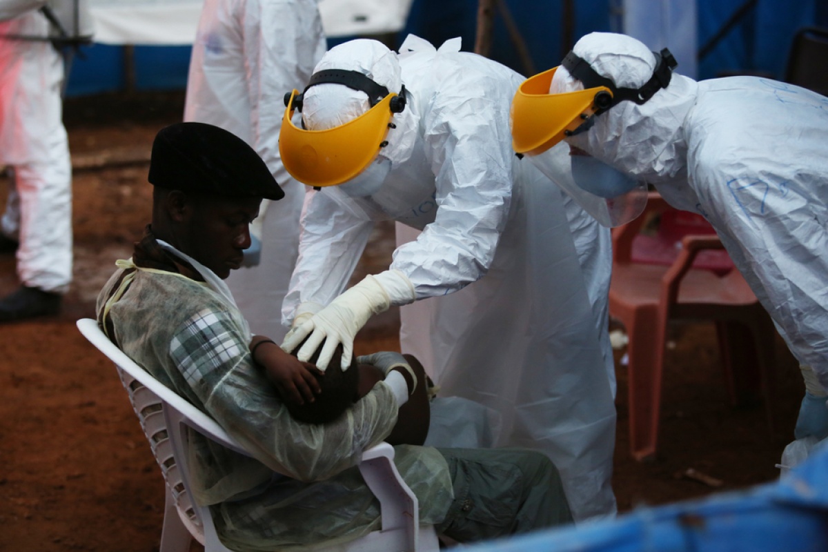 Doctors and nurses provide care to Ebola patients in West Africa