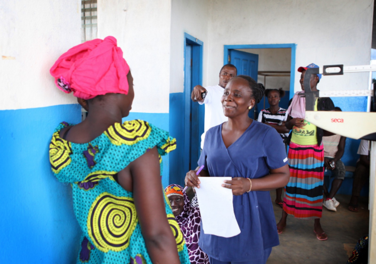 Midwife in Liberia checks in with maternal health patient