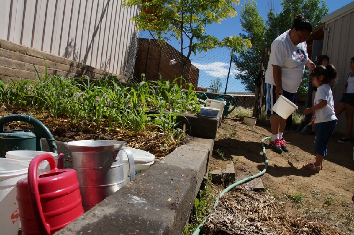 Marcy Martinez and her daughter garden in Ramah, New Mexico