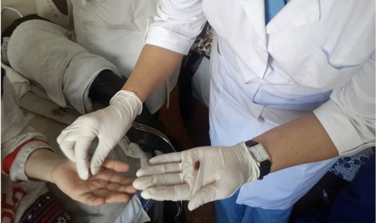 An MDR-TB patients receives medicine in Almaty, Kazakhstan