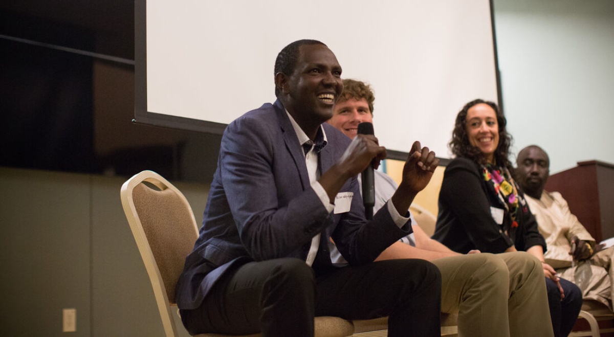 Dr. Melino Ndayizigiye speaks at a cross-site PIH event in 2017