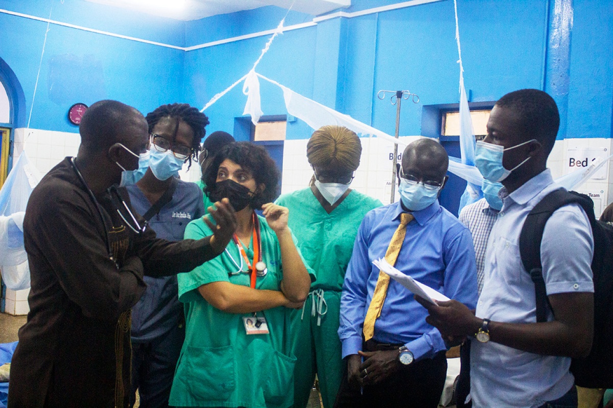 Dr. Marta Patiño and the clinical team discuss PIH's response following the explosion in Freetown.