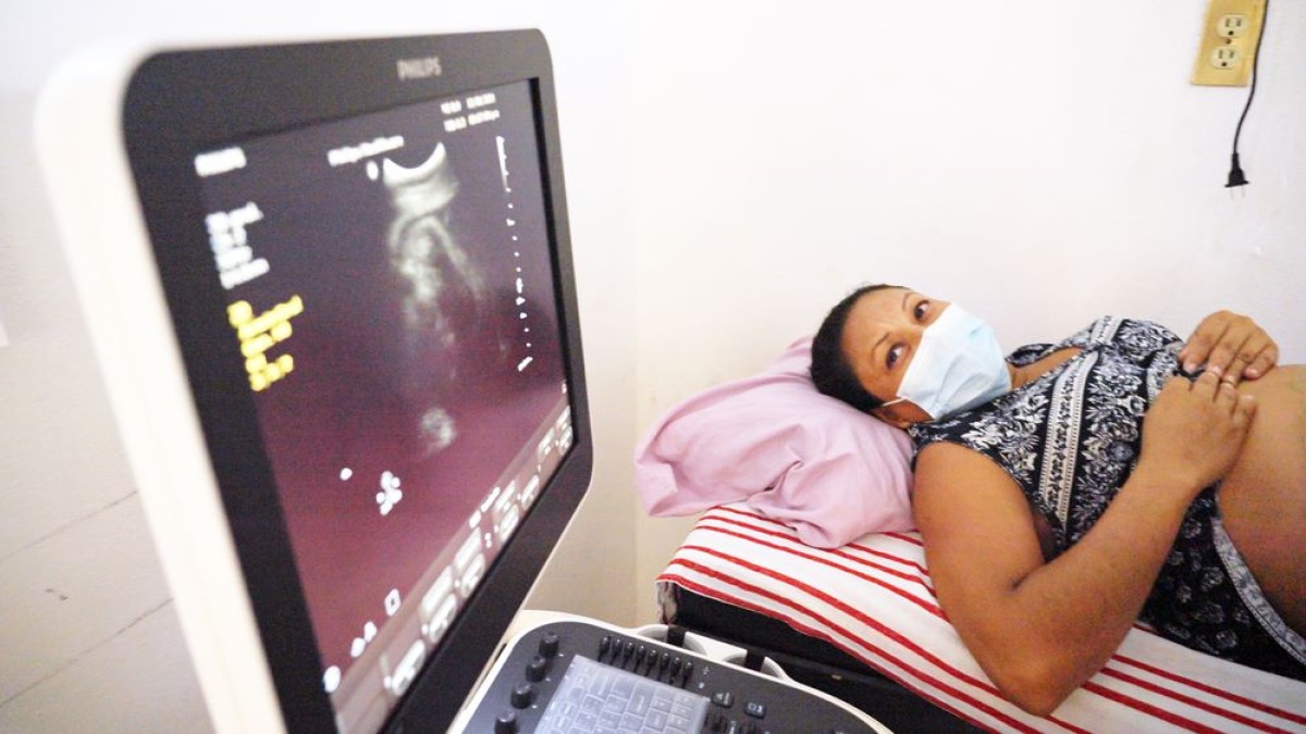 Carmen Ramos Quiroz, patient at Casa Materna, in Mexico, at an ultrasound appointment in October 2021. Compañeros En Salud, as Partners In Health is known locally, has worked there for more than a decade in partnership with the Ministry of Health, providing medical care and social support to thousands of families.