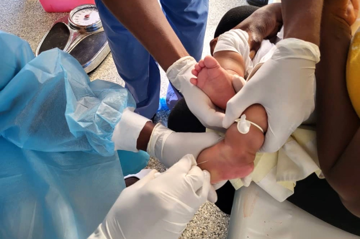 A child receives cholera treatment in Haiti