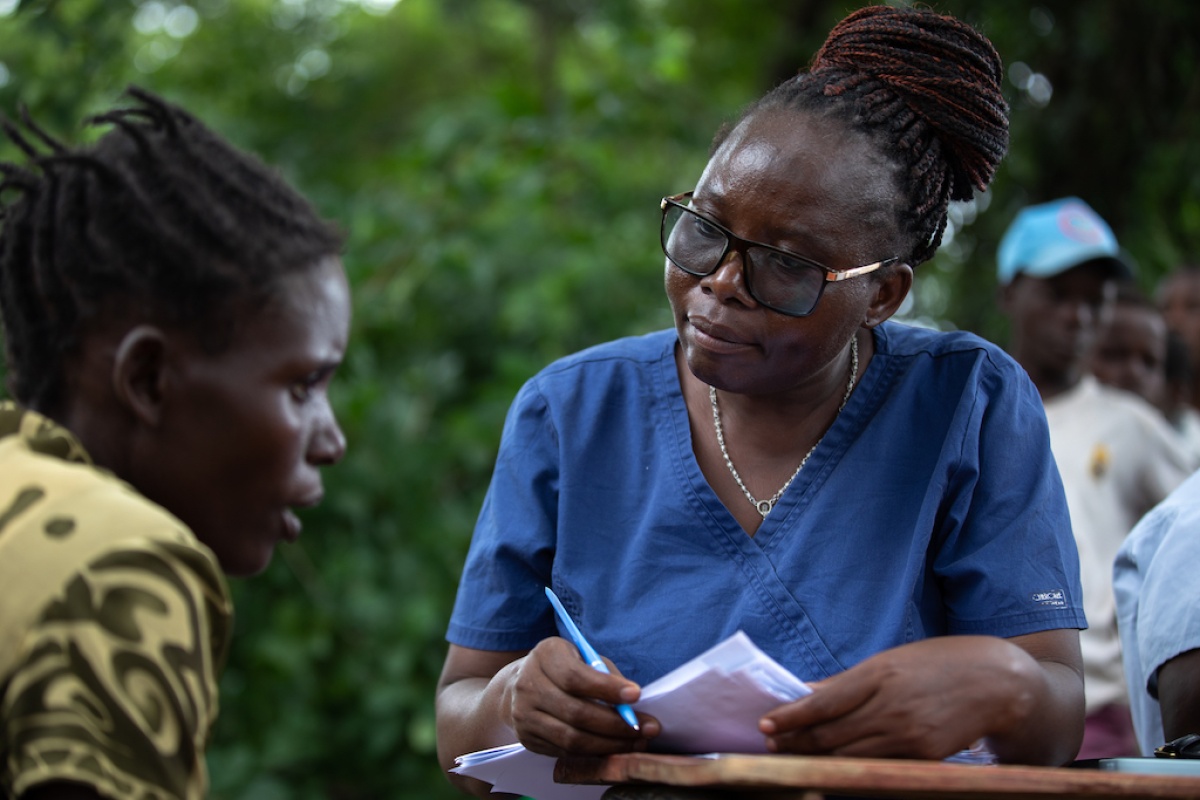 Nurse midwife technician Wezzie Kang'ombe provides clinical services at Somo, Chikwawa District, where a camp for displaced Cyclone Freddy survivors has been established in Malawi.