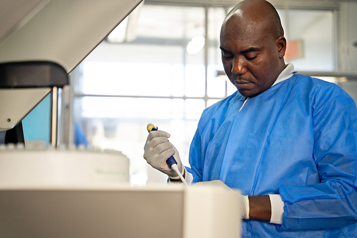 Jean Cosley Gustinvil works in the laboratory at Hôpital Universitaire de Mirebalais in Haiti.