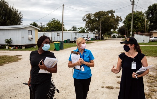 community health workers provide COVID-19 info door to door in Immokalee, Florida