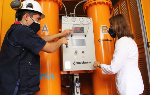 Hospital staff inspect a new oxygen plant in Trujillo, delivered by Socios En Salud and partners