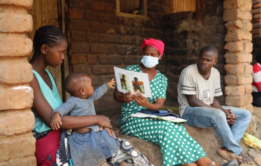 Community health worker Catherine Benito visits a household in Neno District, Malawi.